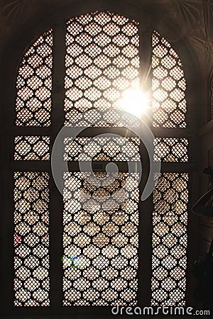 Backlit window highlighting the jaali pattern Stock Photo