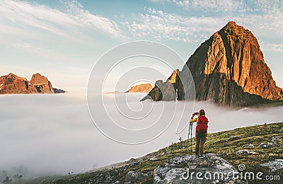 Backpacker exploring sunset rocky mountains in Norway Stock Photo