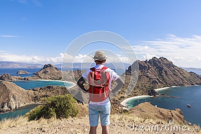 A backpacker at PADAR ISLAND, Komodo National Park, Indonesia Stock Photo