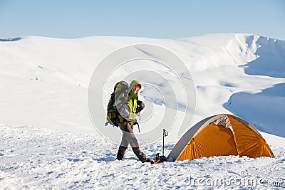 Backpacker woman posing in mountains Stock Photo