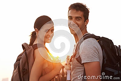 Backpacking...see the world one step at a time. a young couple touring a foreign city. Stock Photo