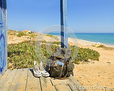 Backpacking traveller in a beach rest. Tavira island, Algarve. Portugal Stock Photo