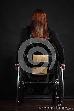 Backside of disabled person. Stock Photo