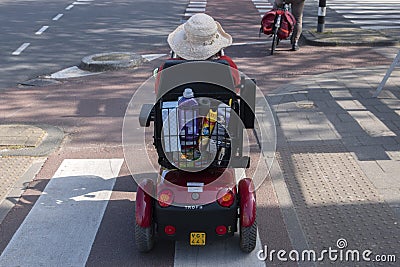 Backside Mobility Scooter At Amsterdam The Netherlands 27-4-2020 Editorial Stock Photo