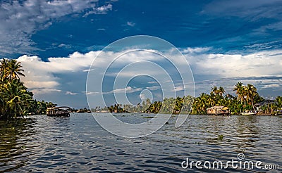 Backwater view with blue sky and palm tree Stock Photo