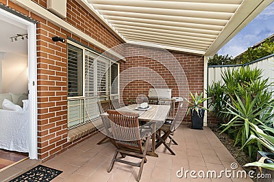 Backyard cozy patio area Stock Photo