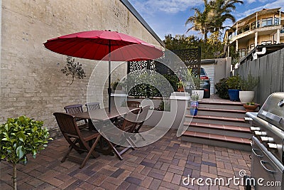 Backyard cozy patio area Stock Photo