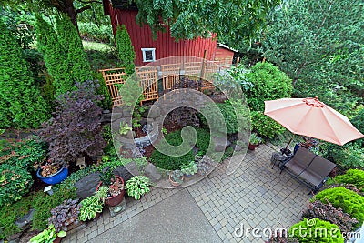 Backyard Patio Landscaping with Red Barn Overview Stock Photo