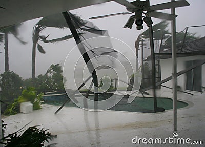 A backyard patio is ripped up from Hurricane winds. Stock Photo