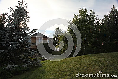 Backyard Paver Patio with Pond in Garden. Backyard Paver Patio Landscaping Overview. Stock Photo