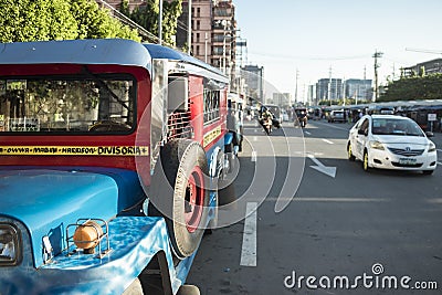 Baclaran, Paranaque, Metro Manila, Philippines - A line of jeepneys is parked by the service road of Roxas boulevard Editorial Stock Photo