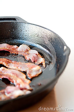 Bacon in a Cast Iron Pan Stock Photo