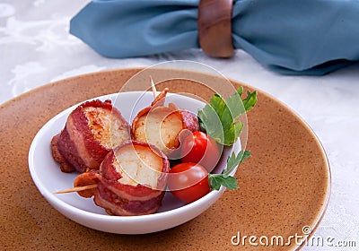 Bacon wrapped scallops Stock Photo