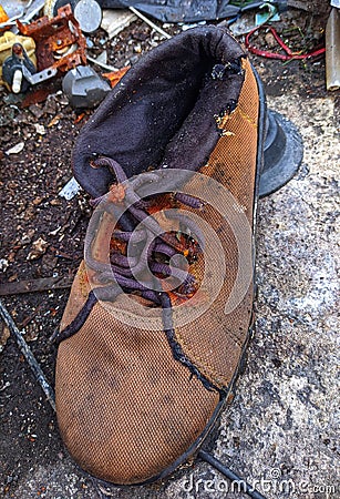 Bad brown broken shoes Stock Photo