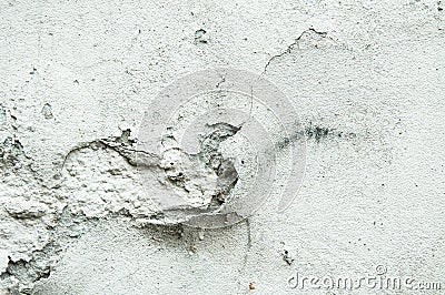 Bad foundation base on old house or building cracked plaster facade wall with brick background Stock Photo