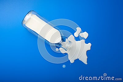 Bad milk lactose intolerance allergy. milk bottle splatter. avoid dangerous dairy Stock Photo