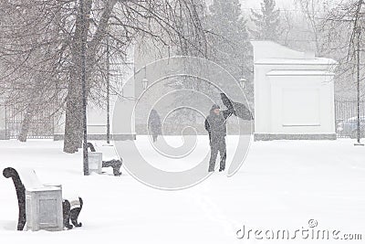 Bad weather in a city: a heavy snowfall and blizzard in winter Stock Photo