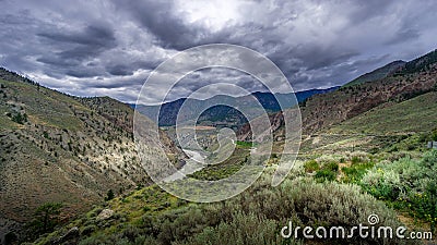 Bad weather hanging over th e Fraser Canyon and Highway 99 near Lillooet in British Columbia Stock Photo