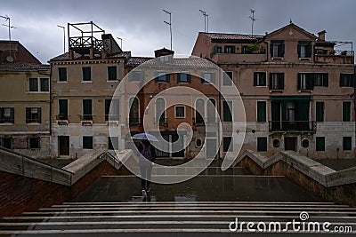 Bad weather in Venice. Bridges and architecture of the old city. Italy Editorial Stock Photo
