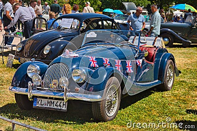 BADEN BADEN, GERMANY - JULY 2022: blue Morgan Plus 8 1968 cabrio roadster, oldtimer meeting in Kurpark Editorial Stock Photo
