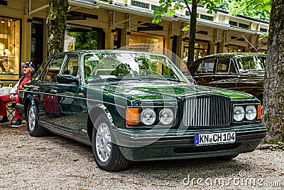 BADEN BADEN, GERMANY - JULY 2019: dark green Crewe Vickers BENTLEY TURBO R 1985, oldtimer meeting in Kurpark Editorial Stock Photo