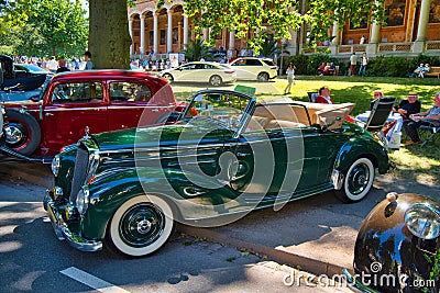 BADEN BADEN, GERMANY - JULY 2022: green Mercedes-Benz W187 1951 cabrio roadster, oldtimer meeting in Kurpark Editorial Stock Photo
