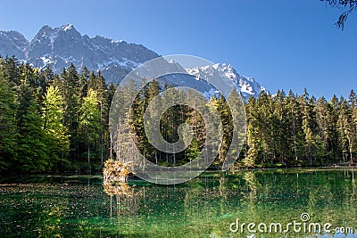 The Badersee and the Zugspitze in Bavaria Stock Photo