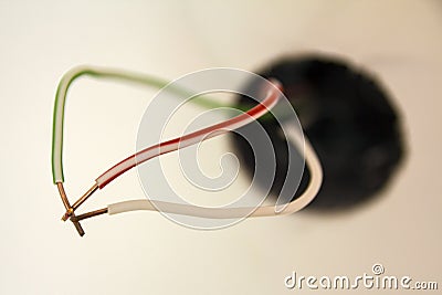 Badly wired plug electric wires showing bad and wrong dangerous connection. Stock Photo