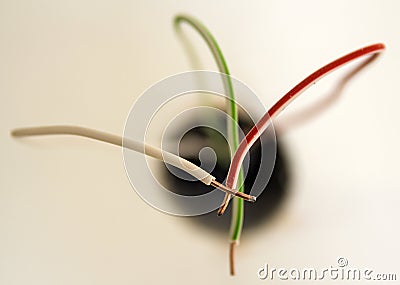 Badly wired plug electric wires showing bad and wrong dangerous connection. Stock Photo