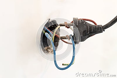 Badly wired plug showing bad and wrong and dangerous connection Stock Photo