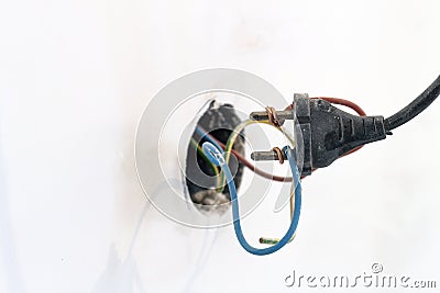 Badly wired plug showing bad and wrong and dangerous connection Stock Photo