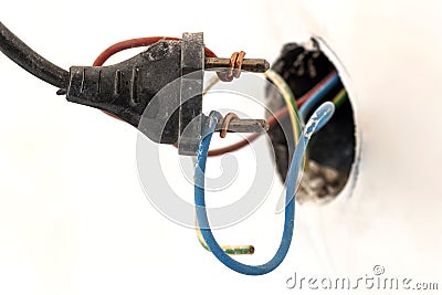 Badly wired plug showing bad and wrong and dangerous connection Stock Photo