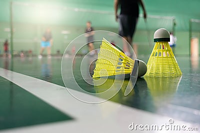 Badminton courts with players competing Stock Photo