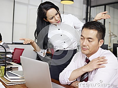 Baffled asian businesswoman Stock Photo