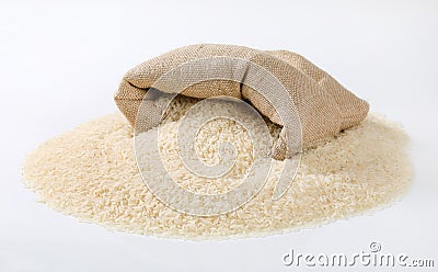 Bag and pile of white long grained rice Stock Photo