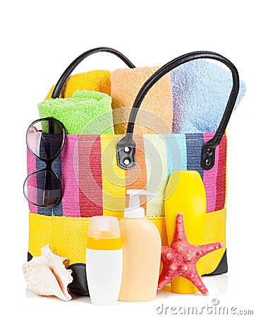 Bag with towels, sunglasses and beach items Stock Photo