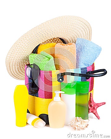 Bag with towels, sunglasses, hat and beach items Stock Photo