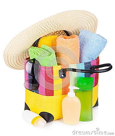 Bag with towels, sunglasses, hat and beach items Stock Photo