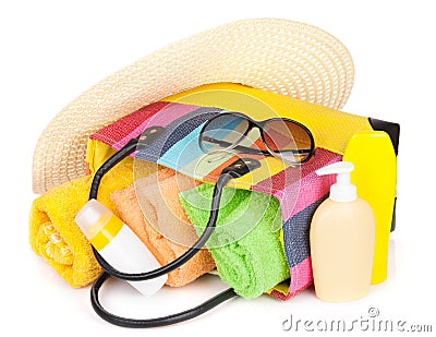 Bag with towels, sunglasses, hat and beach items Stock Photo