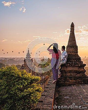 Bagan Myanmar, hot air balloon during Sunrise above temples and pagodas of Bagan Myanmar, Sunrise Pagan Myanmar temple Stock Photo
