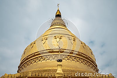 The top of a famous golden stupa pagoda in Bagan, Nyaung-U, Myanmar Stock Photo