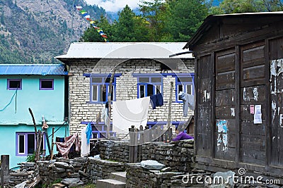 Bagarchhap village, Nepal - 24th of April, 2015 - unidentified nepalese girl in Nepal, Annapurna circuit trek Editorial Stock Photo