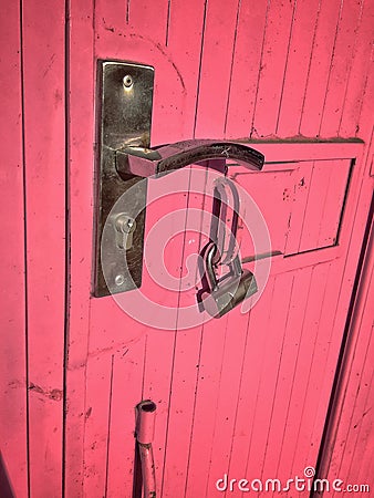 Part of pink metal door Stock Photo