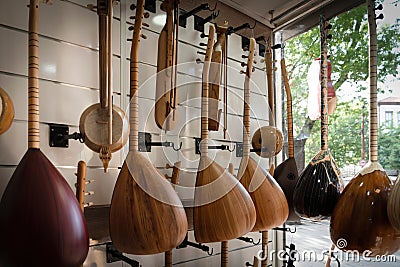 Baglama is a Turkish folk music instrument. Inside view of a baglama shop Stock Photo