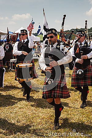 Bagpipe Players and Drummers Editorial Stock Photo
