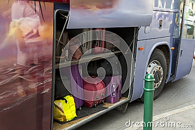 Bags and suitcases in the luggage compartment on a tourist bus Stock Photo