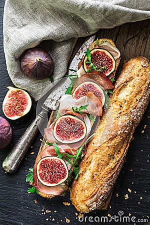 Sandwich with figs and prosciutto Stock Photo