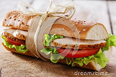 Baguette sandwich with grilled chicken Stock Photo