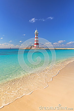 Bahamas Beach with red white Lightouse Stock Photo