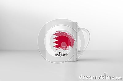 Bahrain flag on white coffee mug. Stock Photo